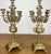 A stunning pair of Vintage French candelabras featuring elegant five arm candle holders and beautifully ornate decorative...