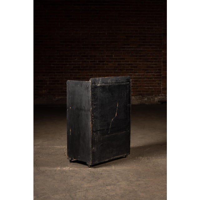 Early 20th Century Wooden 14 Drawer Rolling Shop Cabinet in Distressed Black For Sale - Image 9 of 10