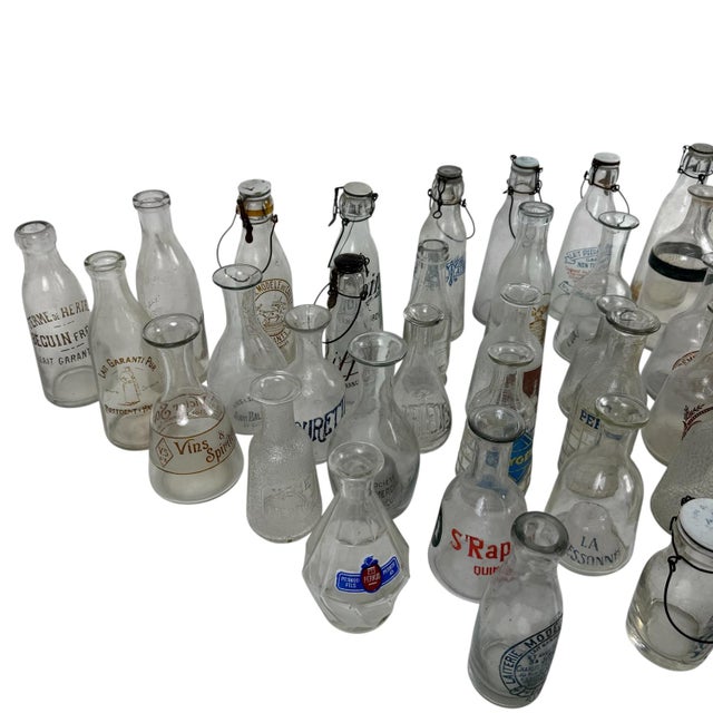 Antique French Glass Bottles of Wine, Liquor and Milk, 1890s, Set of 42, in Very Good conditions. Designed 1890 to 1919
