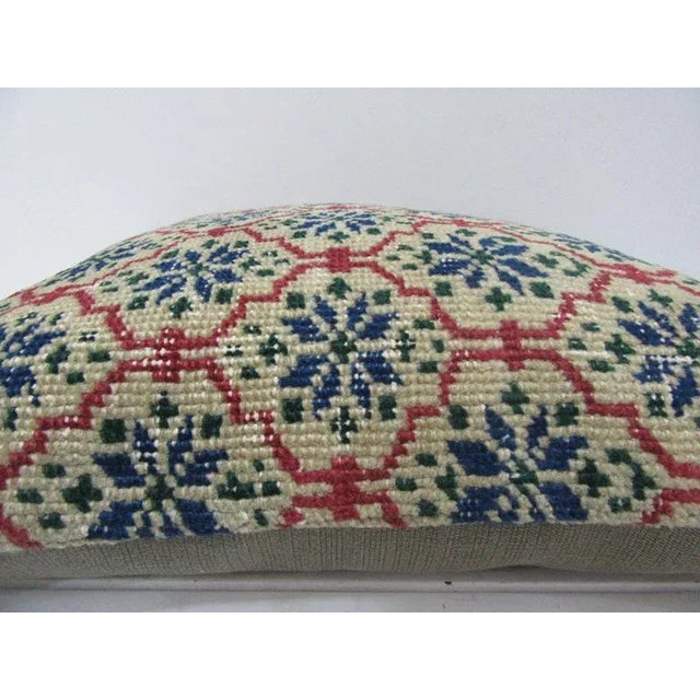 This is a pillow cover made from a vintage kilim rug. The piece was properly washed and ready to use. Pillow inserts not...