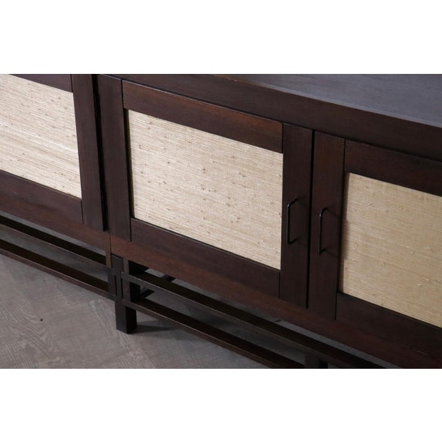 Incredible sideboard, designed by Leonardo Fiori for ISA Bergamo in wengé, seagrass, steel, brass, Italy, 1950s The...