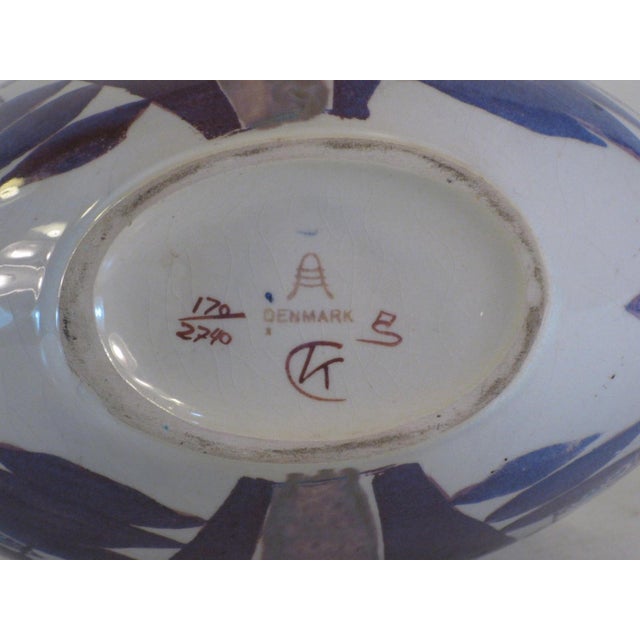 The product is a Danish Modern Faience vase by Royal Copenhagen designed by Kari Christensen. It features an abstract...