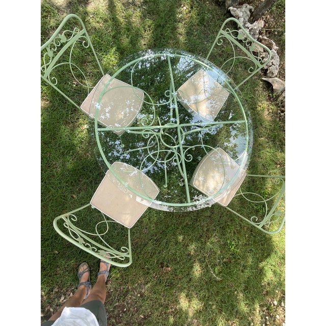 1960’s Russell Woodard patio table and chairs. Glass replaced, but original seats. Great for smaller areas. Can use in a...