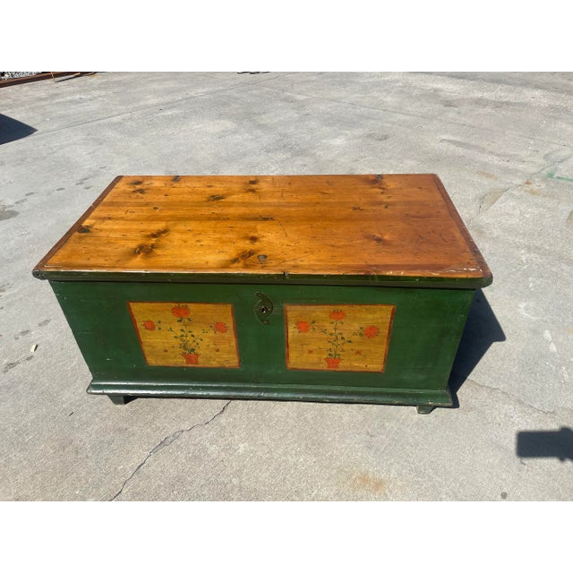 A beautiful Forrest green and natural wood chest, includes small drawer inside. Perfect for storing blankets, clothes, or...