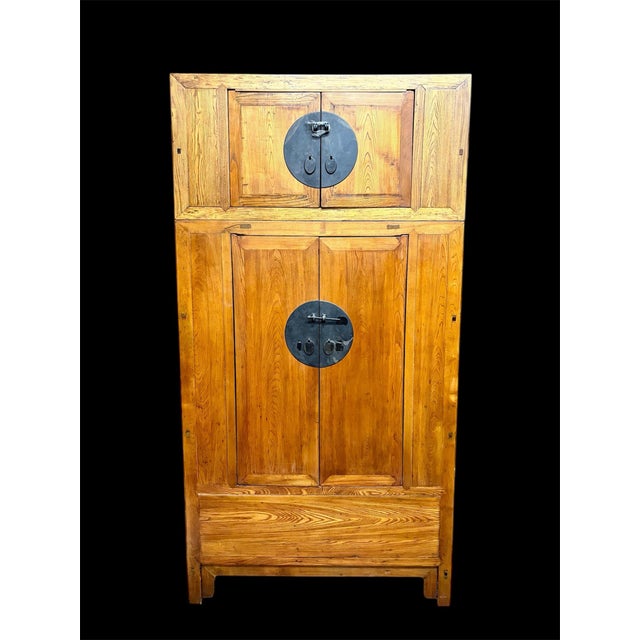 A beautiful 19th century solid hardwood (possibly elm) 4 door cabinet. Simple Ming design with large brass applied moon...