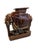 Fabulous with his high-gloss root-beer finish, this vintage ceramic elephant plant stand is very handsome indeed....