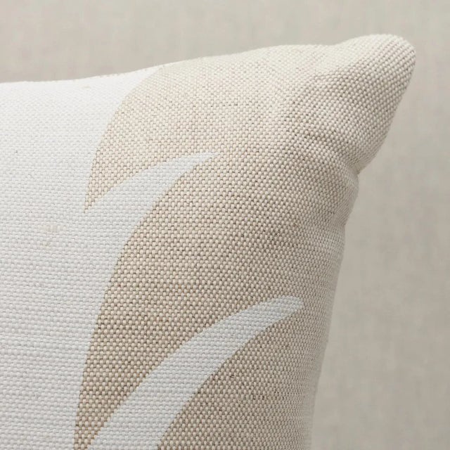 This pillow features Acanthus Stripe by Celerie Kemble for Schumacher with a knife edge finish. This pattern is a stylized...