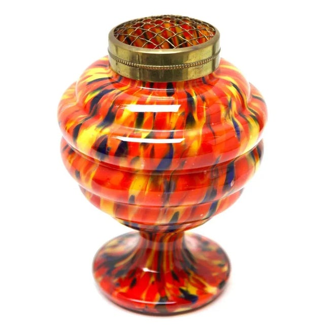 Dramatic multi color decor, cobalt and orange, in hand blown splatter glass vase in the Art Deco style. This design for...