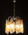 Gorgeous Murano chandelier composed of 8 beautiful twisted logs. Produced by Mazzega glassworks around the 1970s. Chrome-...