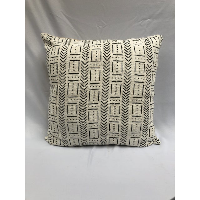 Mud cloth is made in Mali Africa. It is constructed of hand-spun cotton strips. The fabric is then dyed in a bath made of...