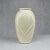 Tall pearlized white 1990’s style glass and ceramic vase in a light white pearlized finish and wonderful proportions. The...