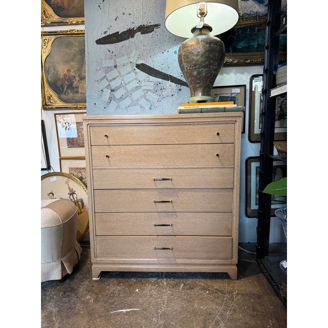 A beautifully proportioned 1940s dresser by United Furniture, crafted in warm blonde mahogany with a refined, transitional...