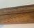 This is a very primitive frame with lots of knots, raw wood and burlap. This is a check the pictures situation. Somebody...