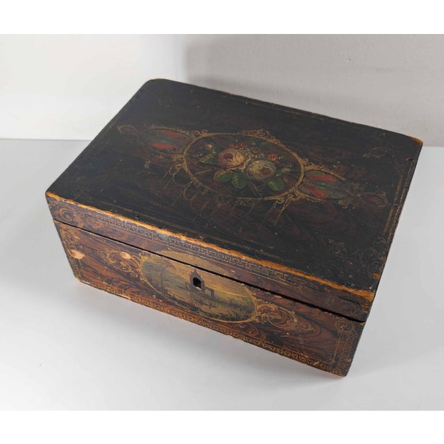 We are selling this great 19th century American Folk art Box. This box has simple construction with faux grain painted...