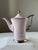 An elegant pink porcelain set by Loket Epiag for four people. Fine, thin-walled porcelain in a soft pink tone with a...