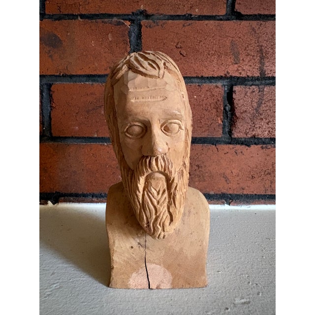 One-of-a-kind vintage hand-carved wood bust depicting a bearded male figure with wonderfully expressive, primitive folk-...
