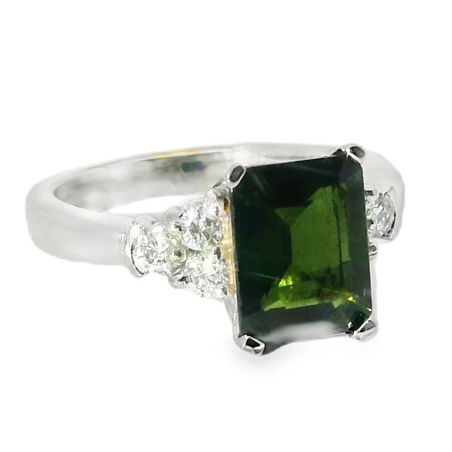 Add a touch of elegance to your collection with this Estate 14K White Gold Tourmaline and Diamond Solitaire Ring....