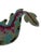 This is contemporary Decorative table runner by Kim Seybert, featuring an elaborate dragon motif rendered entirely in...