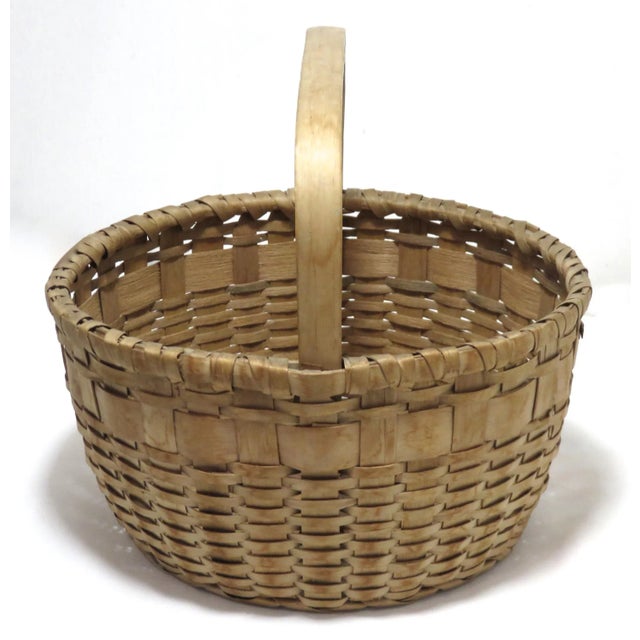 A finely hand woven antique carry basket from the state of Maine. Circa Early 20th Century. I acquired this piece on one...