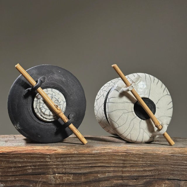 Pair of Vintage Japanese Studio Craft Raku Fired Stoneware Vessels with Lids, Signed. Pair of white crackle glazed raku...