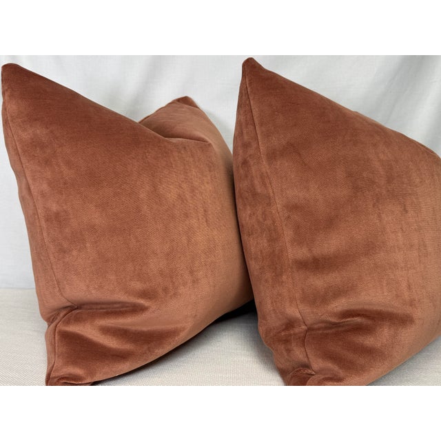 Custom pair of 22" pillows covered in a dusty rose colored velvet. These pillows have tapered corners to prevent dog ears,...