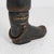 Copper umbrella stand shaped like a boot with great attention to detail