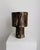 Brown Ceramic Lamp Details: • Material: clay • Finish: Hand-applied textured glaze in soft neutral tones • Dimensions:...