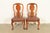 An outstanding pair of antique English Georgian or Queen Anne side chairs or dining chairs In the manner of Baker...