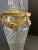 Crystal vase with gilt bronze mounts circa 1890-1910. rimmed on the top and bottom in gold and ornate swags all around the...