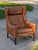 Listed is a Fredrik Kayser style (untagged) Lounge Chair with rose wood legs. These chairs resemble the Borge Mogensen...