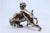 Silver Naked Child with Animal Figurine in Silver For Sale - Image 8 of 9