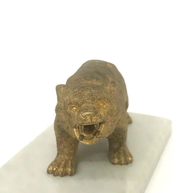 "Growling Bear" paperweight, made of gilded bronze on a marble pedestal. Tsarist Russia. 1900, H-6.5 cm.