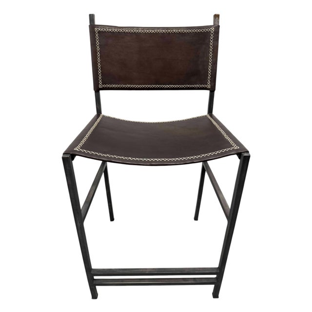 Quick Hits Sol & Luna brown leather and iron counter stool Rich brown leather seat, sturdy iron frame Hand-stitched...