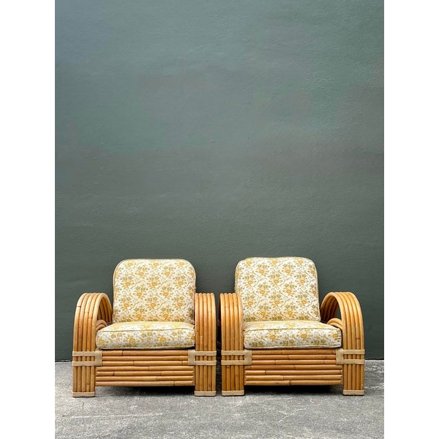 This exceptional pair of vintage lounge chairs by Tropitan represents the height of 1950s tropical modernism. Heavily...