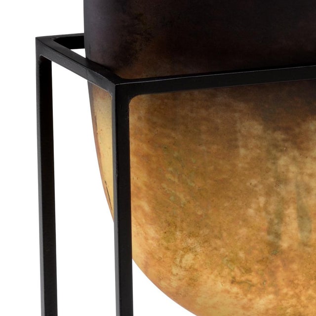 Sunset ombre glass vase in iron stand. 11.8h x 12.5w x 4.3d