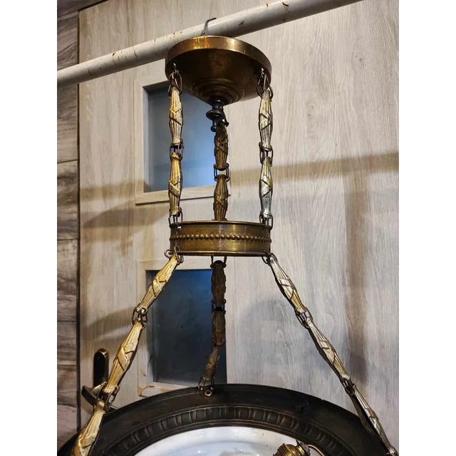 Art deco brass chandelier, dimensions: height 57 cm, diameter 36 cm. European Plug (up to 250V).The wiring of this item...