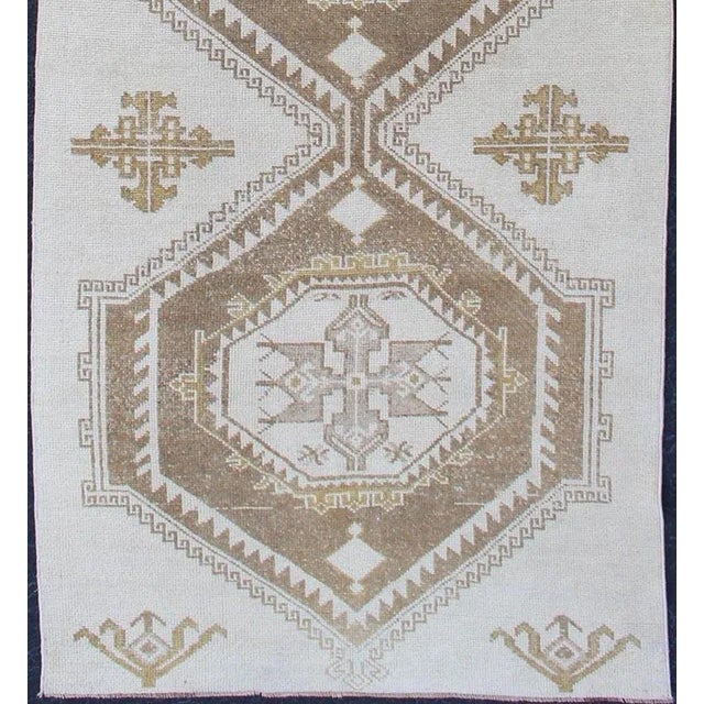 Turkish Subdued Vintage Hand Knotted Turkish Oushak Runner With Medallions in Cream and Brown For Sale - Image 3 of 8