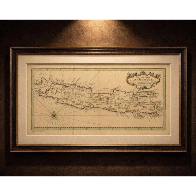 Antique map of java indonesia, voc period, decorative cartouche, c.1750 a finely engraved and highly decorative antique...