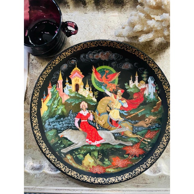 Gorgeous work of Russian art, from the 1990s, this vividly colored decorative plate is in jewel tones that are bright....