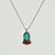 Vintage Home is pleased to present this Southwestern Navajo style Turquoise and Coral Sterling Sliver Pendant Necklace....