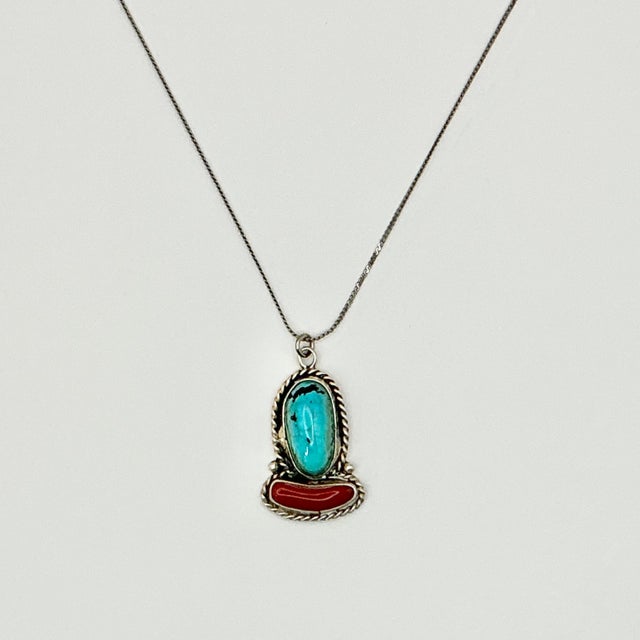 Vintage Home is pleased to present this Southwestern Navajo style Turquoise and Coral Sterling Sliver Pendant Necklace....
