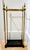 Elegant vintage umbrella stand featuring a solid cast iron drip tray base and warm brass frame with four decorative flame-...