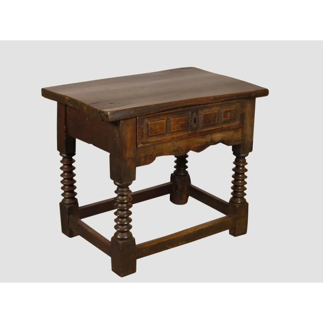 17th-C. Spanish Baroque walnut side table with a single frieze drawer, original iron hardware and rich original patina.