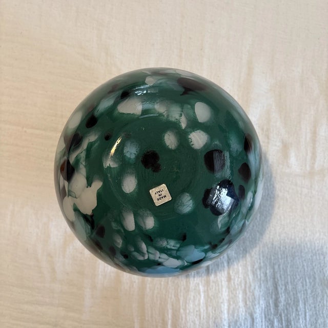 Beautiful vintage Murano hand-blown glass vase, featuring an eye-catching swirl pattern in blue, green, and teal tones....