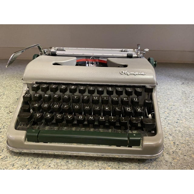Vintage Model SM 4 Typewriter from Olympia, 1960s, in Good conditions. Designed 1960 to 1969 This piece has an attribution...