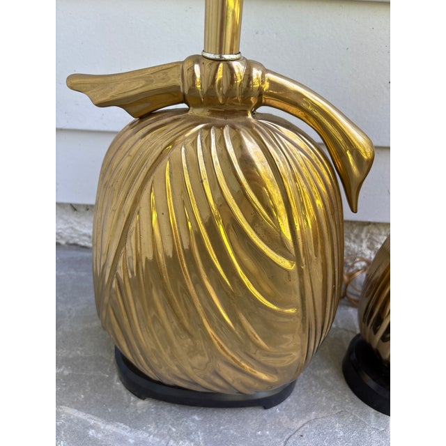 Beautiful pair of Dorothy Draper Chapman brass draped, Swan Lamps. Each lamp measures 10.5”’wide with a raised base.