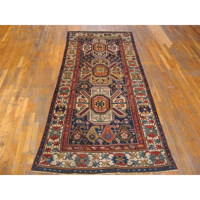 Antique Caucasian rug, size: 4'3" x 9'0" Navy background. Hallway Runner Rugs (4.03ft x 9ft), Country of Origin: Caucasus,...