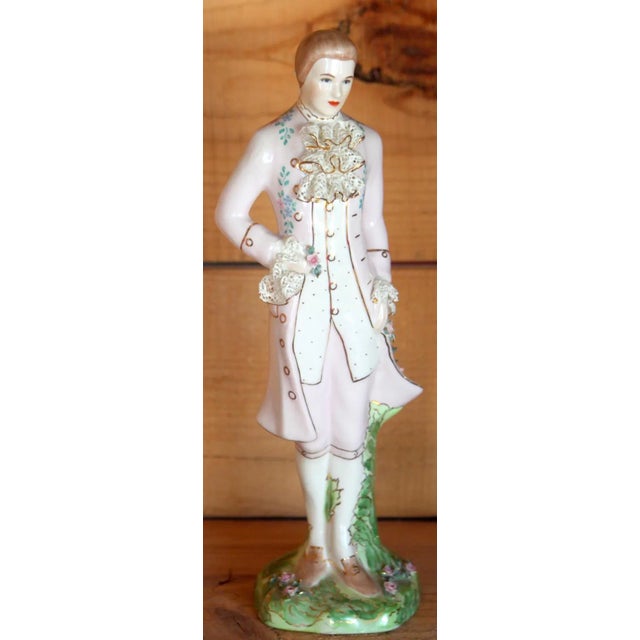 This vintage porcelain figurine is a stunning addition to any collector's display. Made by Lee Wollard, this Gentleman's...