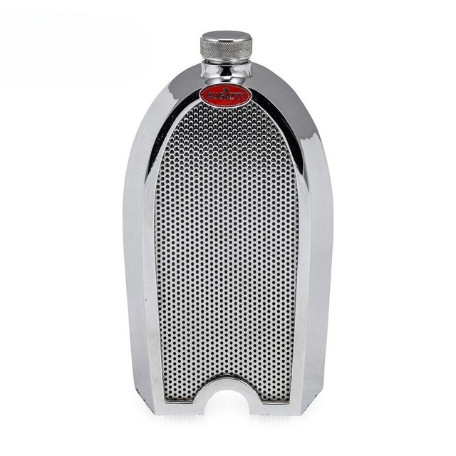 A vintage bugatti chrome radiator grille decanter made in england in the 1970s, bearing the red enamel radiator badge. The...