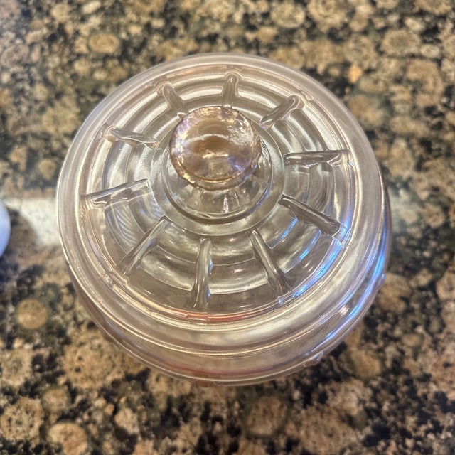 This is a vintage pink depression glass biscuit or cookie jar, specifically identified as a ribbed or paneled design...